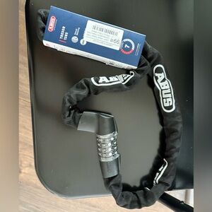 Abus heavy duty bike lock as shown.